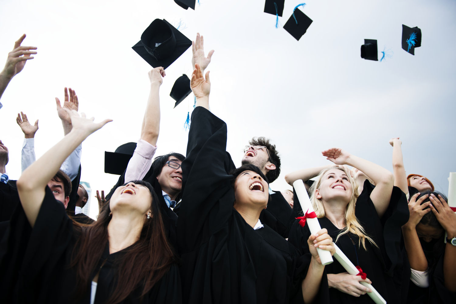 https://www.freepik.com/free-photo/group-diverse-grads-throwing-caps-up-sky_3366984.htm#query=graduates%20position=3%20from%20view=search%20track=sph